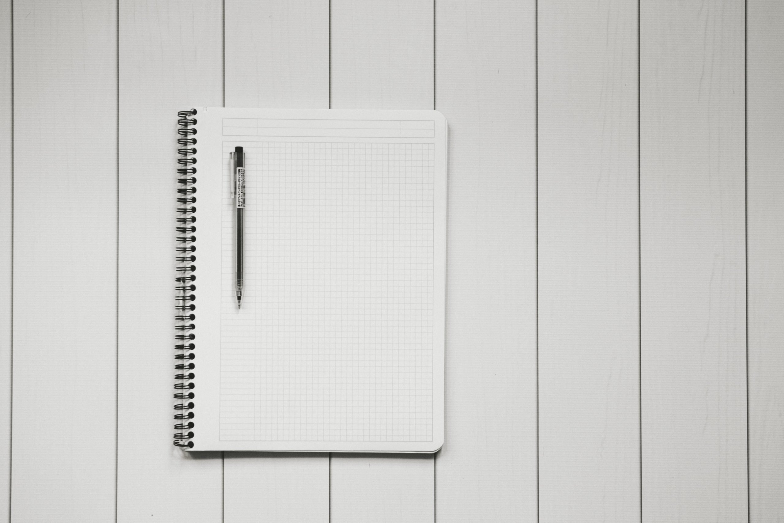 blank paper with pen
