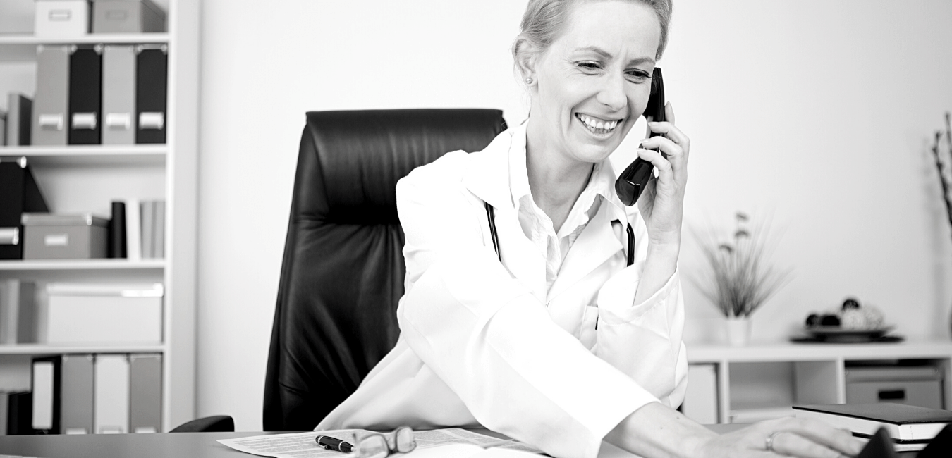 Physician on phone with former referral source