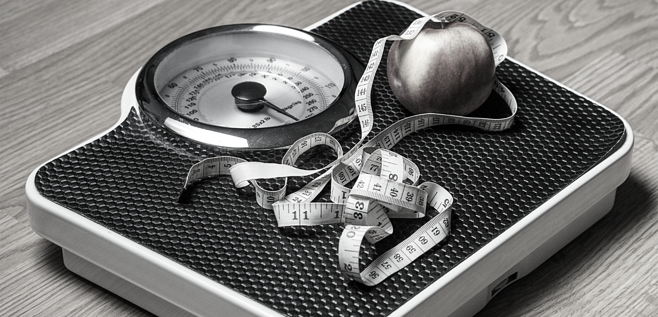 Scale, tape measure, apple